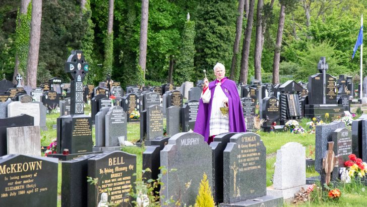 Bishop leads blessing of the graves