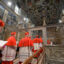 How do the cardinals get to the conclave?