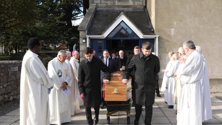 Eulogy cut short at funeral Mass splits opinions online