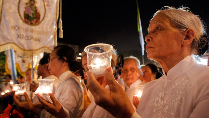 A candlelit procession in Hanoi
