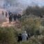 Israeli settlers attack olive harvest of Christian villagers in the West Bank