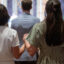 Questions of Faith: Is it appropriate to hold hands or lift your hands up during the Our Father at Mass?