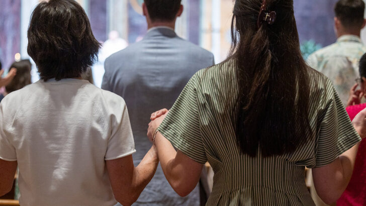 Questions of Faith: Is it appropriate to hold hands or lift your hands up during the Our Father at Mass?